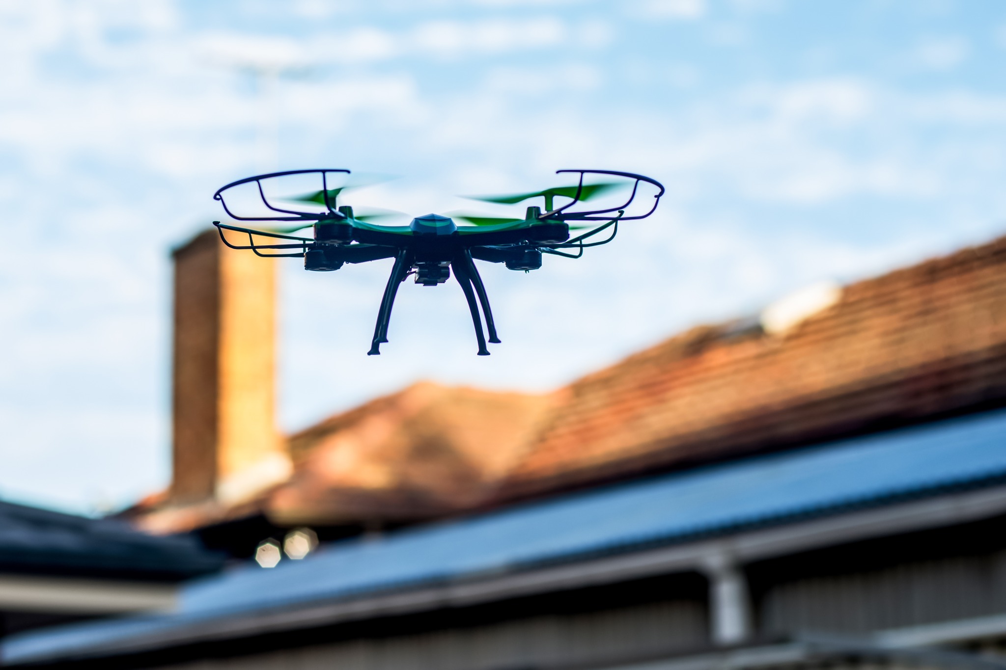 Drone performing roofing survey