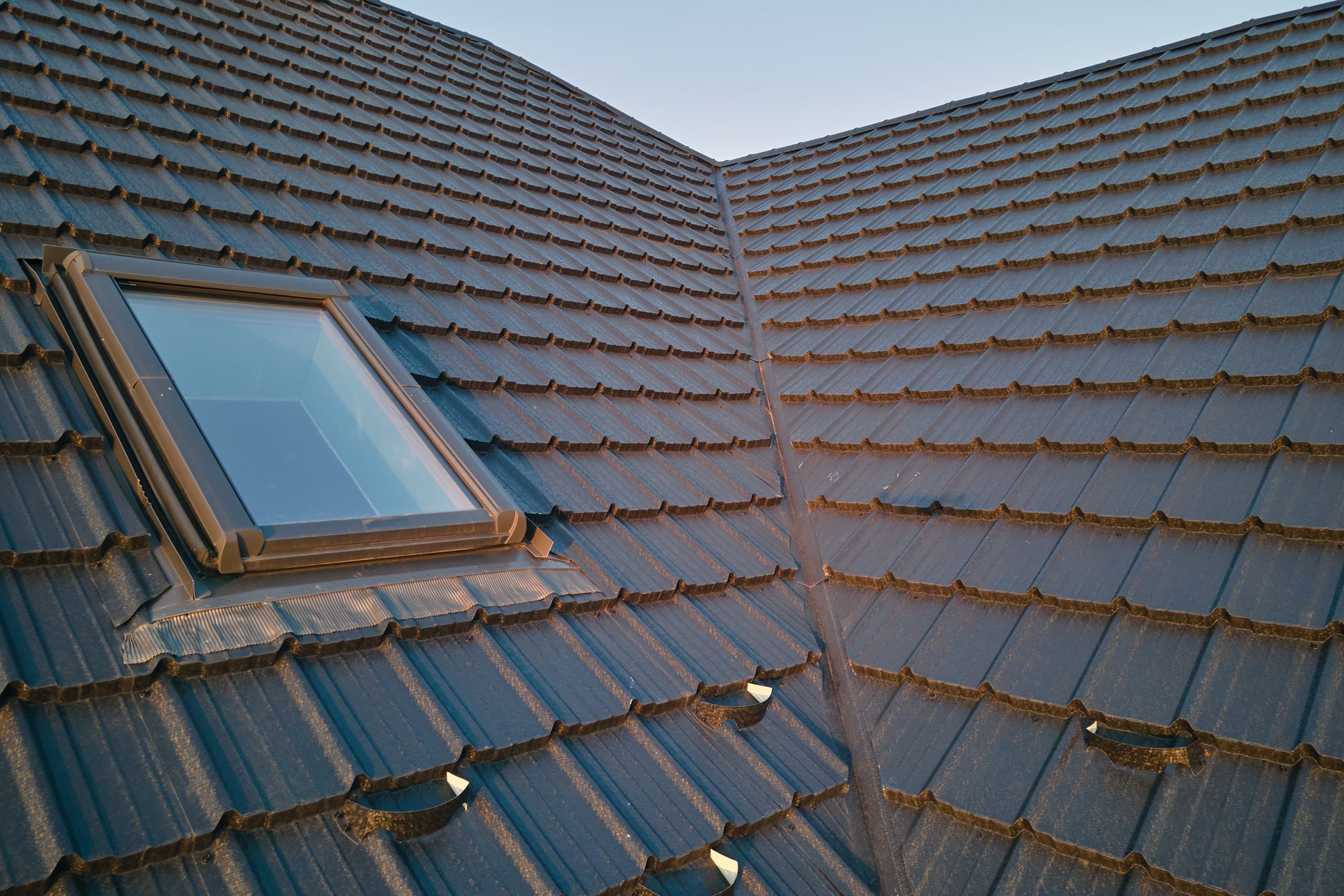 Lead flashing installation around skylight and roof valley Lead flashing installation around skylight and roof valley